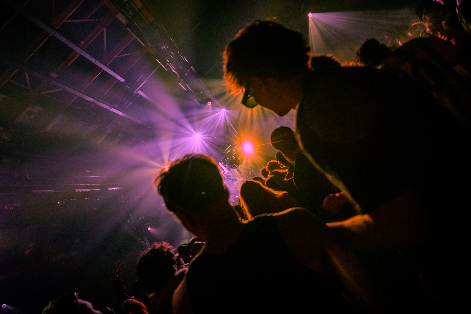 Silhouettes against stage lights